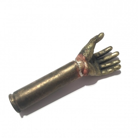 Brass hand object in bullet case    